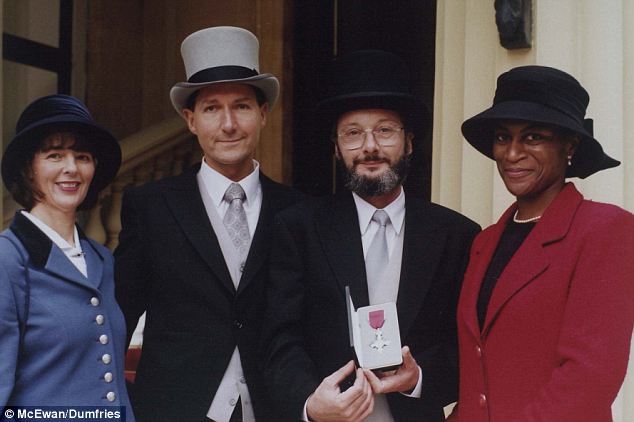 Honoured: Mr Dale after being awarded the MBE at Buckingham Palace with his brother Ian and Ian's wife Janet and friend Andrea